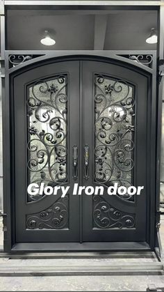 an ornate iron door with the words glory iron door on it's side entrance