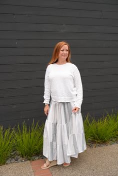 Embrace timeless elegance with the Darcy Long Skirt in Sea Salt 🌊. Fit: Designed with a comfortable elastic waistband and a flowing, tiered silhouette for a flattering fit. Feature: Made from soft and breathable Turkish Cotton fabric in a serene sea salt hue, perfect for beachy, boho vibes. Why We Love It: Its versatile design and calming color make it an ideal choice for both casual and chic looks. Handcrafted with love in the Carolinas! Each piece is truly one-of-a-kind, made with sustainable Flowy Long Skirt With Layered Hem, Breezy Flowy Maxi Skirt With Elastic Waistband, Flowy Tiered Skirt With Layered Hem, Casual Stretch Skirt For Layering, Breezy Tiered Lined Maxi Skirt, Breezy Tiered Maxi Skirt, Breezy Tiered Maxi Skirt With Lining, Breezy Ruffled Tiered Maxi Skirt, Breezy Tiered Ruffle Maxi Skirt