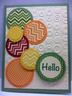 a close up of a greeting card with buttons on it's side and the words hello