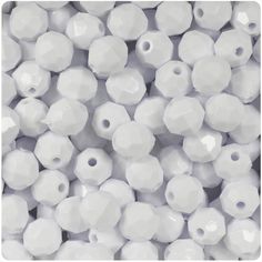 white plastic beads with holes in the middle