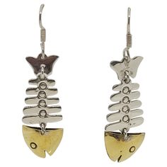 Stylish silver and gold plated fish bone earrings with a hook and weighing 11.3 grams. These fun earrings were made in Mexico, stamped Mexico 925 measuring 58 x 40 mm in size. Overall, these earrings are in very good condition and make a fun addition to any jewelry collection. Please let us know if you have additional questions. Rock N Gold Creations is located in San Diego, California, serving customers locally, nationally, and internationally for over 30 years. Pre-owned jewelry and watches ar Bone Earrings, Design Competitions, Fine Watches, Fish Bone, San Diego California, Fun Earrings, Rock N, Estate Jewelry, 30 Years