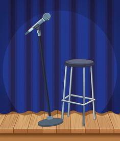 a microphone and stool in front of a stage with a curtain behind it, on a wooden floor