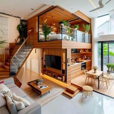 a living room filled with furniture next to a staircase