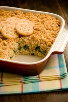 a casserole dish with crackers on top