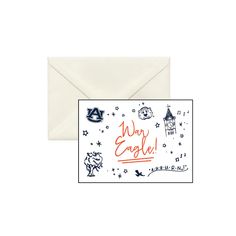 a white envelope with an orange and black greeting card