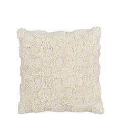 a white pillow with small squares on the front and back, made out of wool