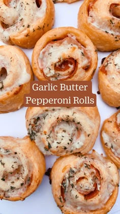 garlic butter pepperoni rolls on a white plate with the title overlay reads garlic butter pepperoni rolls