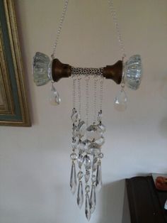 a chandelier hanging from the ceiling in a room