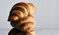 three croissants stacked on top of each other