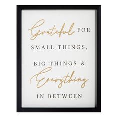 a black and white framed sign with gold lettering on it that says grateful for small things, big things & everything in between