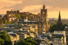 the skyline of edinburgh, scotland at sunset