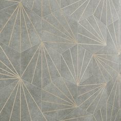 an abstract wallpaper with gold lines and shapes on grey cement tiles, designed in the style of art deco