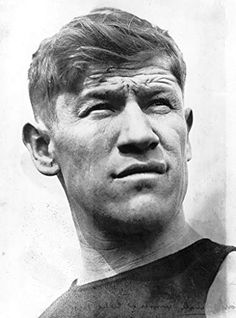 an old black and white photo of a man with his eyes wide open, looking to the side