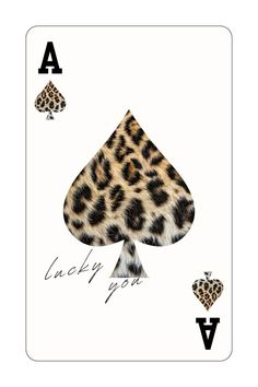 a playing card with the words lucky you in leopard print, and two hearts on each side