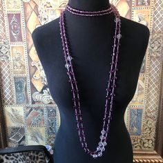 ON SALE Very pretty long purple and clear glass statement necklace that is in excellent vintage condition. Measures 116 inches long which is nice because you can wear it in so many different ways. Very classic addition to any wardrobe or high-end jewelry collection. Elegant Purple Necklace For Party, Purple Crystal Necklaces For Party, Elegant Long Purple Necklace, Long Glass Beaded Necklaces For Party, Long Glass Beaded Necklace For Party, Elegant Purple Necklace With Faceted Beads, Elegant Purple Necklaces With Faceted Beads, Elegant Glass Crystal Necklaces For Party, Elegant Multi-strand Purple Beaded Necklaces