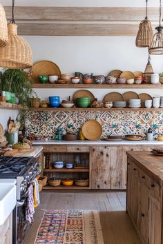 a kitchen filled with lots of wooden shelves