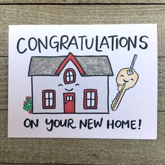 congratulations on your new home with a house and keys attached to the front of it