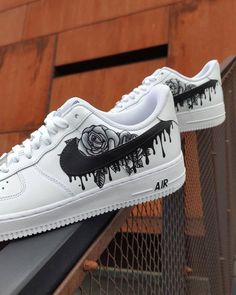 The Black RoseDrip Custom Air Force 1 is a beautiful, custom sneaker. This model features a sleek black upper, paired with a unique rose-colored drip design, sure to make a fashion statement. The low-cut silhouette provides comfort and superior support while the signature Nike branding adorns the tongue and heel. Stand Παπούτσια Nike Free, Обувь Air Jordan, Buty Marki Nike, Custom Sneakers Diy, Boty Nike, Skor Sneakers, Custom Shoes Diy, Painted Sneakers, Nike Shoes Girls