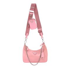 This is an authentic PRADA Nylon Re-Edition 2005 Shoulder Bag in Rosa. This petite messenger bag is crafted of pink nylon with polished silver hardware. It features saffiano cross-grain leather trim an adjustable pink nylon crossbody strap, a silver chain strap, and a removable coin purse. The top zipper opens to a pink Prada monogram jacquard interior. Trendy Pink Shoulder Bag With Silver-tone Hardware, Pink Crossbody Shoulder Bag With Silver-tone Hardware, Pink Nylon Bag With Detachable Strap, Pink Nylon Shoulder Bag With Detachable Strap, Pink Nylon Shoulder Bag With Adjustable Strap, Prada Nylon Re Edition, Pink Prada, Leopard Print Tote, Prada Re Edition