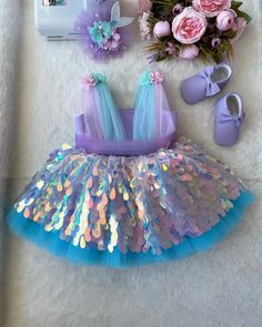 custom handmade dresses for your baby.used hologram mermaid sequins.Crafted with soft cotton lining.back zipper dress.easy to wear dress with zipper.Dress for 1 and 5 year olds,For more questions vek you can leave a message Whimsical Sequined Dresses For Parties, Blue Mermaid Hem Dress For Pageant, Purple Princess Dress With Sequins, Princess Style Purple Sequin Dress, Purple Sequined Princess Dress, Blue Princess Mermaid Dress For Pageant, Princess Style Blue Mermaid Dress For Pageant, Princess Blue Tulle Mermaid Dress, Princess Mermaid Dress For Pageant