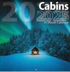 a calendar with an image of a cabin in the snow and aurora lights above it