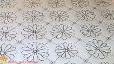 the paper has been drawn with black ink on it and is laid out to look like flowers