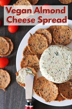 vegan almond cheese spread on a plate with crackers