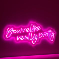 a neon sign that says you're like really pretty