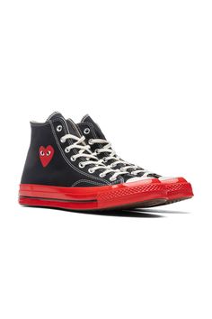 Reimagining the first Converse x PLAY Comme des Garçons design, this iteration features a red midsole and foxing with a contrast pinstripe and is rendered in both black and white premium canvas stamped with the instantly recognisable heart-and-eyes logo.Upper: TextileSole: RubberPlease note these run 1/2 a size large, we recommend sizing down. Cdg Logo, Comme Des Garcons Play Converse, Play X Converse, Converse Comme Des Garcons, Play Converse, Cdg Play, Converse Red, Play Comme Des Garcons, Comme Des Garcons Shirt