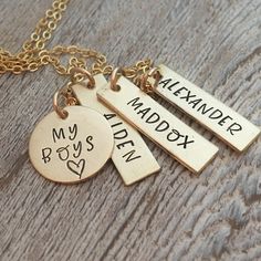 "My Boys - hand stamped personalized necklace - mothers necklace - Gift for Mom of Boys - Gold Filled Mommy Necklace - Gold Mom Necklace 1 5/8\" gold filled disc stamped \"my boys\" 1\" gold filled rectangle name tags (You choose how many name tags you need from the drop down box) The charms hang from a gold filled cable chain. Info to include in the notes to seller during checkout: names/words to stamp on each charm length of chain (16, 18 or 20 inches) As with all hand stamped jewelry, each pi Mommy Necklace, Mom Of Boys, Custom Charm Necklaces, Custom Charms, Mothers Necklace, Hand Stamped Jewelry, Mom Necklace, Stamped Jewelry, Personalized Necklace