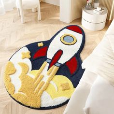 a rug with a rocket ship on it