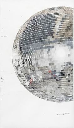 a large mirror ball hanging from the ceiling