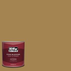 a can of behrut ultra stain - blocking paint on a brown background with the words