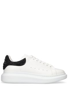 45mm Rubber sole. Leather upper. Front lace-up closure. Reinforced eyelets. Embellished heel detail. Logo details Embellished Sneakers, Mcqueen Sneakers, Embellished Heels, Alexander Mcqueen Men, Sports Sweatshirts, Crossbody Messenger Bag, Sport Watches, Sport Bag, Sport Pants