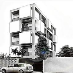 a car parked in front of a tall building with balconies on the sides