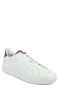 A touch of rich color elevates a stylish Italian sneaker crafted from supple leather with smart arch support. Lace-up closure Removable insole Leather upper and lining/rubber sole Made in Italy Men's Shoes Italian Sneakers, Sneaker Men, Mens Shoes Sneakers, Arch Support, White Sneaker, Tan Leather, Rich Color, Arch, Men's Shoes