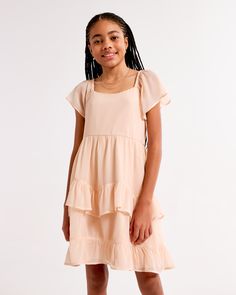 Flattering short-sleeve mini dress in our soft chiffon fabric, with on-trend flutter sleeves, ruffle details and a tiered skirt. Ruffle Mini Dress, Short Sleeve Mini Dress, Abercrombie Kids, Dress Girls, Tiered Skirt, Flutter Sleeves, Mini Dress With Sleeves, Dress Romper, Chiffon Fabric