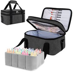 an open lunch bag with markers and pencils in the bottom, along with two cooler bags filled with pens