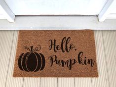 a door mat that says hello pumpkin on it