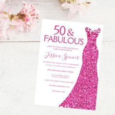 the pink dress is on top of the white card and it says 50 and fabulous