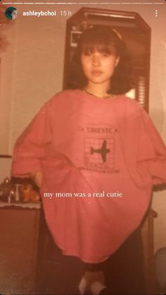 an old photo of a young woman in a pink shirt with the words, my mom was a real cutie