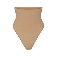 Get ultimate compression with our highest support level in this high-rise shapewear thong that sculpts, smooths, and tones your core and tummy. Wear this silky staple under everything to enhance your natural shape. Features removable adjustable straps. | SKIMS High-Waisted Thong | Medium Neutral | Core Control Solid Full Coverage Second-skin Shapewear, Full Coverage Second-skin Shapewear, Solid Second-skin Shapewear Full Coverage, Second-skin Shapewear With Full Coverage, Second-skin Full Coverage Shapewear, Beige High Waist Compressive Shapewear, Elegant Compressive Beige Shapewear, Contoured Solid Shapewear With Smoothing Details, Solid Sculpting Shapewear With Seamless Construction