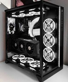 a black and white photo of a computer case with fanless fans on the side