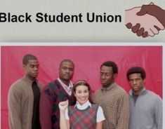 a group of people standing next to each other in front of a red background with the words black student union on it