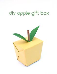 an origami apple gift box is shown with the words diy apple gift box