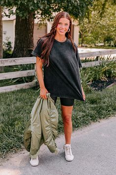 - This is the perfect oversized tee for your collection of closet essentials! - Unlined 100% cotton material - A crew cut neckline - Short, loose sleeves - An oversized silhouette that ends in a straight hemline Oversized Soft-washed Black T-shirt, Oversized Washed Black Sporty Tops, Sporty Oversized Washed Black Tops, Washed Black Crew Neck T-shirt For Fall, Black Soft-washed T-shirt For Loungewear, Soft-washed Black T-shirt For Loungewear, Washed Black Crew Neck T-shirt For Loungewear, Black Oversized T-shirt For Spring, Oversized Black T-shirt For Spring