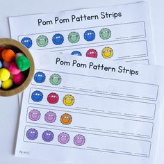 two worksheets for pom pom pattern strips on a table with candy