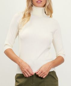 Stay cozy and chic with our High Neck 3Q Sleeve Sweater in Ivory. The high neckline and 3/4 sleeves add a touch of elegance, while keeping you warm and stylish. Perfect for any occasion, this sweater is a must-have for your wardrobe. 50% Viscose 22% Nylon 28% Polyester Model is 5'9 and wearing a size small Party Sweaters, Neck Cream, Turtle Neck Sweater, Curvy Dress, Turtle Neck Top, Sweater Pullover, Stay Cozy, Sweater Sleeves, Clothes Gift