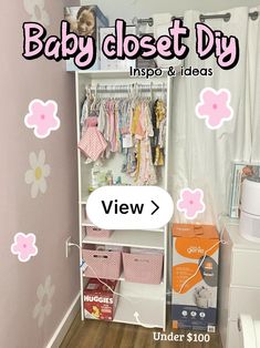 the baby closet is open and has pink flowers on it, along with other items