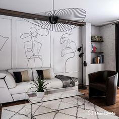 a living room with white furniture and black accents